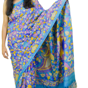 Handwoven pure silk saree in royal blue with intricate floral motifs and artistic detailing, elegantly draped by a woman